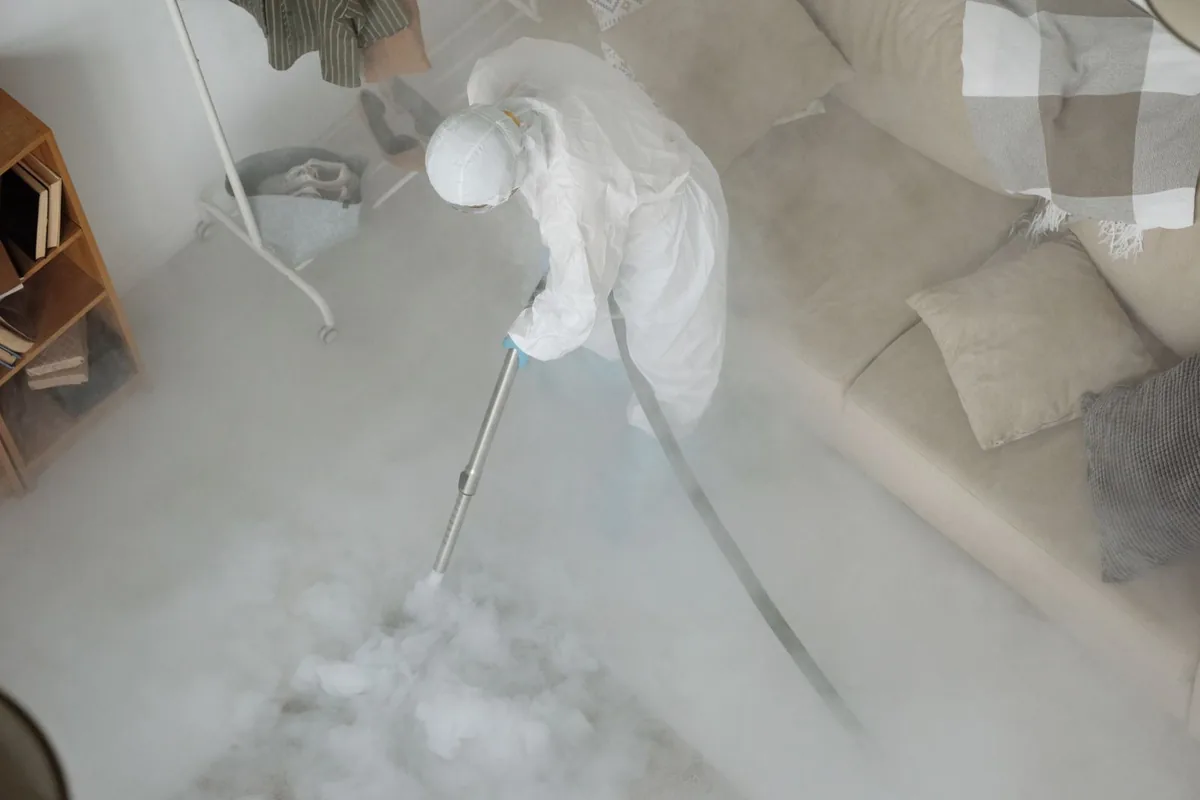 Biohazard cleanup technician in protective equipment, Crozet, VA